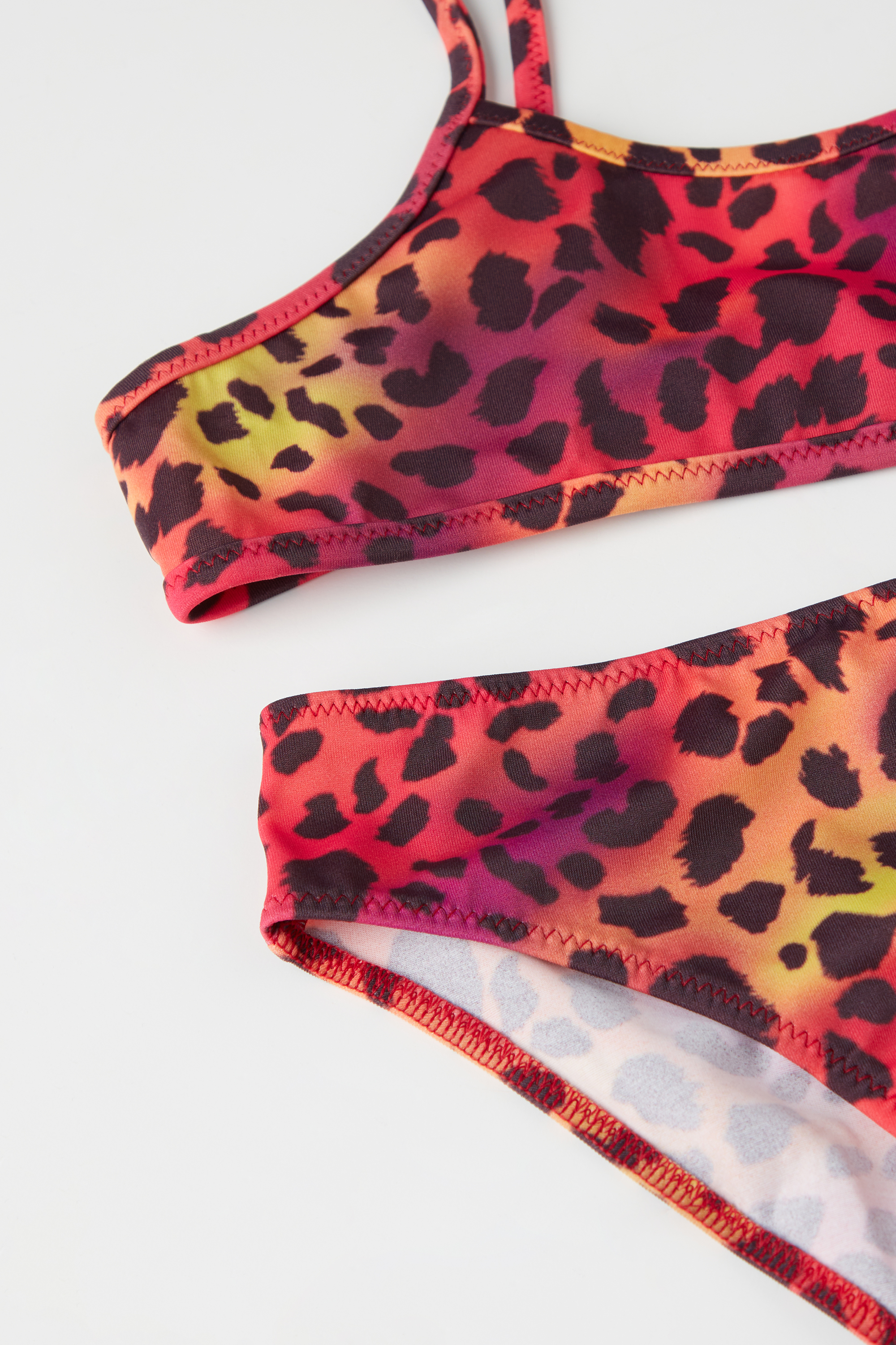Bustier-Bikinioberteil und Slip mit farbigem Leoprint für Mädchen