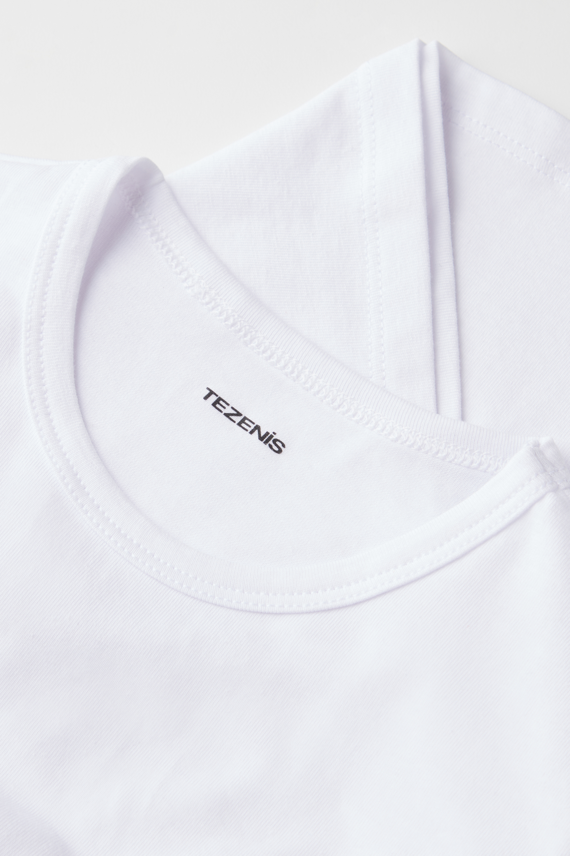T-Shirt Básica Decote Redondo em Algodão Elástico Criança Unissexo