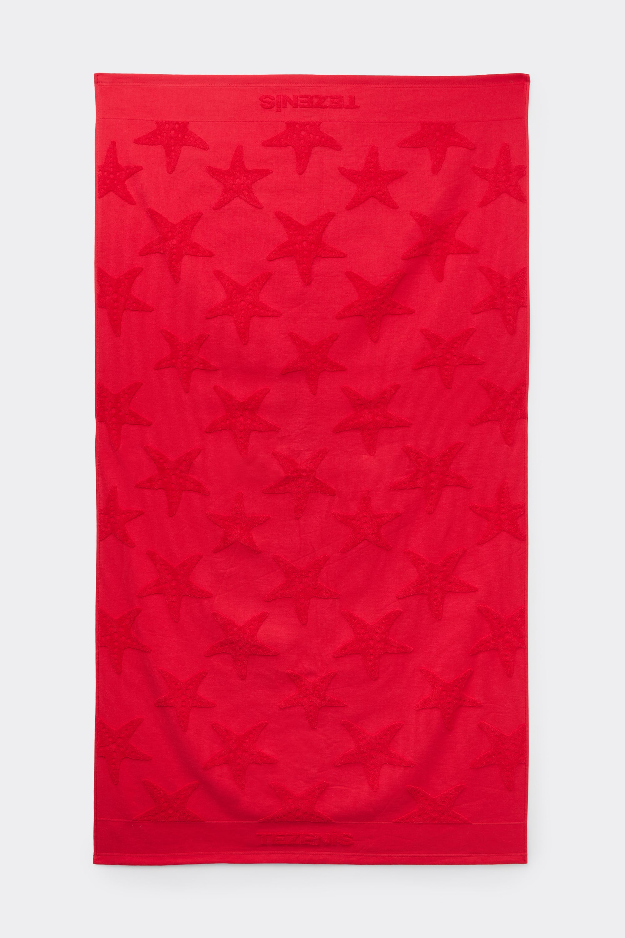 Devor&eacute; Frott&iacute;r Unisex Strandt&ouml;r&ouml;lk&ouml;ző