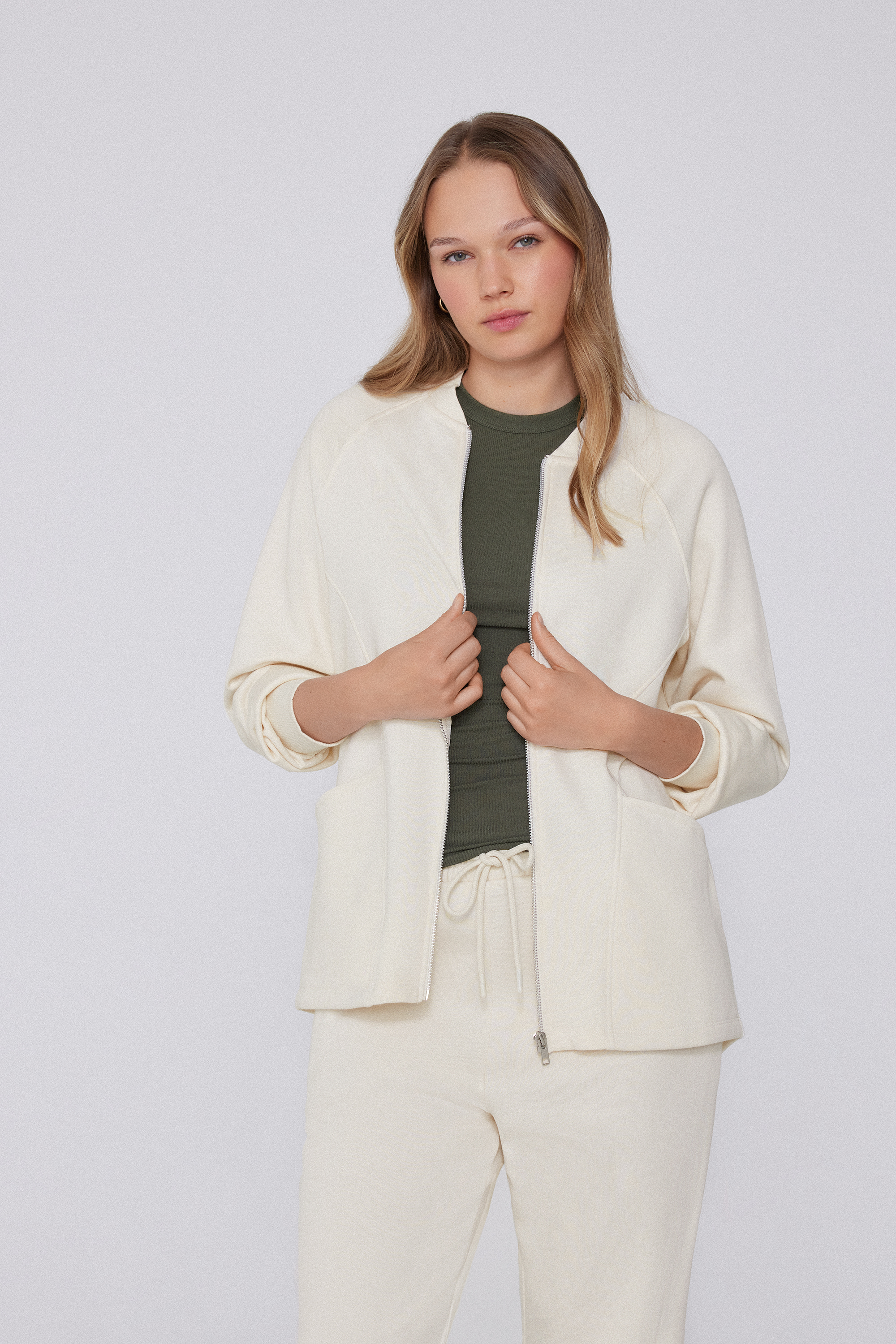 Lange asymmetrische Sweatjacke mit Reißverschluss und Taschen